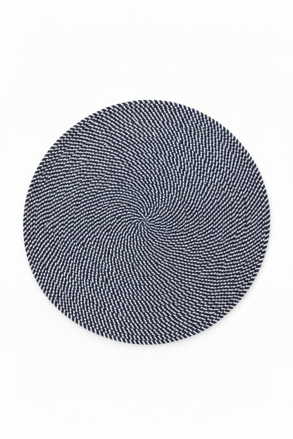 Round Navy and white woven placemat. 