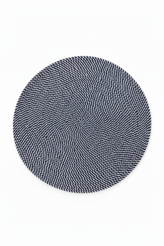 Round Navy and white woven placemat. 